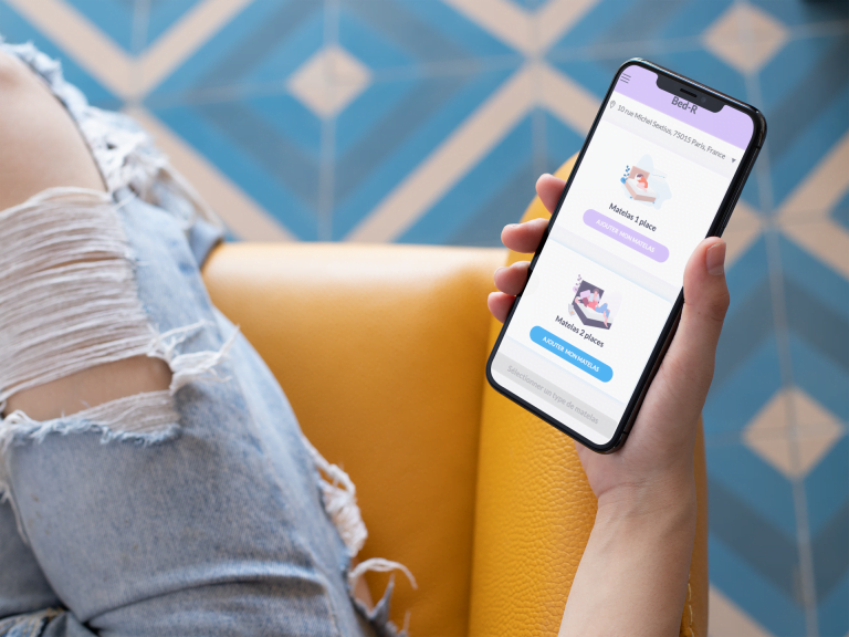 mockup-of-a-girl-in-ripped-jeans-holding-her-iphone-xs-max-25822 (1)